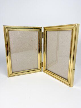 Vintage brass double folding frame - 5 x 7" photos